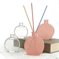 Bouteille diffuseur vide en verre décoratif rechargeable pour désodorisant d'ambiance, avec bâtonnets en rotin et bouchon en liège