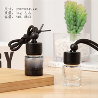 Bouteille diffuseur de parfum de voiture ronde vide personnalisée de 8 ml en verre avec bouchon en bois à vis noir et pendentif, flacons diffuseurs d'arômes noirs