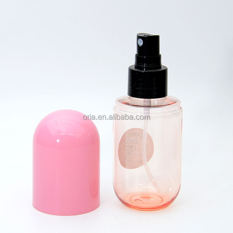 Botella de plástico en aerosol rosa roja