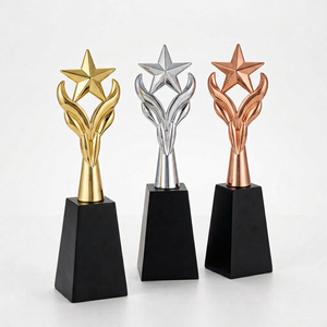 Star <b>Trophy</b> With Gold Plated Finish Model 750 A For Sports And Games Engraving Durable metal star <b>trophy</b> with wooden black base - Product Image 1