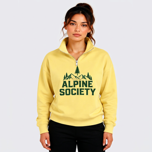 เสื้อสเวตเชิ้ตผู้หญิงสีเหลืองแบบคอซิป คอตั้ง แขนยาว ลายกราฟิก Alpine Society ผ้าฝ้าย - Product Image 1