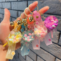 Offre Spéciale – Porte-clés mignon en forme de sucette avec perles à bulles, bouteilles de sable flottant en acrylique, petits ornements de style dessin animé, étanches