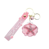 Porte-clés en acrylique en forme d'étoile de mer avec bouteille flottante pour sable mouvant, idéal pour voiture, sac à dos d'étudiant, petit cadeau, ornement suspendu