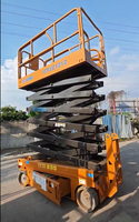 Plateforme élévatrice à ciseaux électrique XCMG GTJZ1212 d'occasion, hauteur de plateforme 12m, capacité 320kg, autopropulsée, pour entrepôt et construction