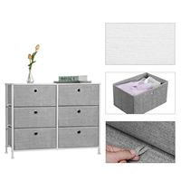 Commode de rangement moderne en tissu avec 3 bacs et 6 tiroirs à ouverture facile pour la literie et les chaussures