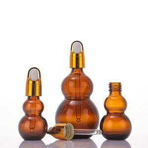 Fabrik preis Probe Kostenlos 10ml 20ml 30ml Doppel kürbis form Bernstein ätherisches Öl Glas Tropf flasche mit Gold Blumen korb kappe - Product Image 2