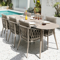 Ensemble de table à manger d'extérieur moderne avec structure en aluminium et chaises en rotin imperméables - 6 places pour restaurant