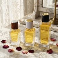 Flacon en verre carré de luxe transparent personnalisé exclusif de 30 ml, 50 ml, 100 ml avec couvercle et emballage de boîte haut de gamme pour flacon de parfum