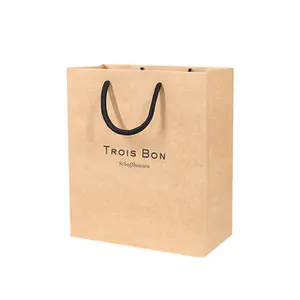 Il produttore personalizza il tuo Logo stampato sacchetto della spesa in carta per imballaggio regalo di lusso con manico