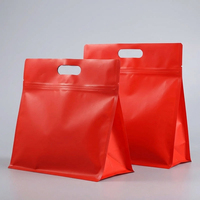 Sacs d'emballage à fond plat anti-fuite en BOPP VMPET PE rouge mat avec poignée découpée pour café, thé, collations