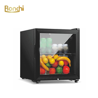 Mini-réfrigérateur à vin de style moderne, écologique, de petite capacité (50L), à porte simple, pour hôtel, maison ou usage domestique.