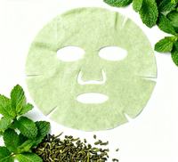 Feuille de masquage sèche jetable pour le visage au thé vert Masque facial de soins de la peau de beauté naturelle avec fonction de blanchiment Fabriqué en matériau de qualité supérieure