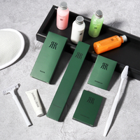 Ensemble d'articles de toilette jetables conformes RoHS pour hôtels : pantoufles de douche et de bain, pantoufles de voyage et kits de shampoing pour salle de bain d'hôtel