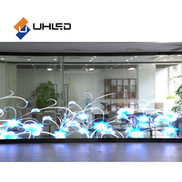 Film LED intérieur transparent pour fenêtre en verre Film LED HD polychrome pour affichage de publicité commerciale Écran LED transparent P10