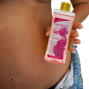 Terapia DE LA PIEL Reduce las estrías Aceite de vitamina E Premium Aceite de masaje reafirmante Blanqueador Compre a granel para reventa sin pegajosidad - Product Image 4