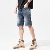 Jeans décontractés pour hommes à la mode de rue jambe large demi-pantalon bas court design baggy