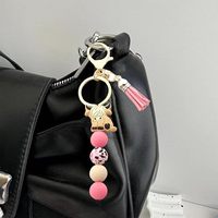 Porte-clés Premium Vache des Highlands avec perles, perles en silicone faites à la main, pendentif pompon, accessoire élégant pour sacs, clés et plus encore