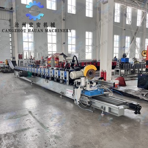 Machine à poutres pour rayonnages d'entrepôt HAUAN avec coupe à la scie volante et soudage laser, contrôlée par PLC, dotée d'un moteur à engrenages et d'un moteur. - Product Image 2