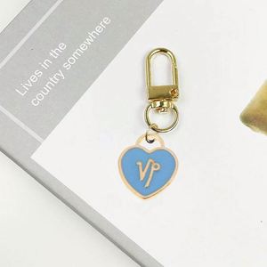 พวงกุญแจและคาราไบเนอร์แบบโปรโมชั่น พวงกุญแจโลหะแบบกำหนดเอง รูปหัวใจสุดสร้างสรรค์ พวงกุญแจคุณภาพสูง - Product Image 3