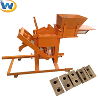 Machine manuelle écologique et mobile à pression pour la fabrication de blocs de terre imbriqués avec boîte de vitesses - Utilisation simple, faible consommation d'énergie