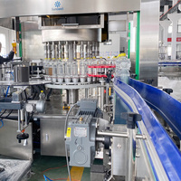 Machine d'étiquetage d'autocollants OPP entièrement automatique pour bouteilles en PET