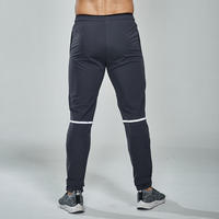 Pantalon de jogging élastique pour homme, motif uni, avec fermeture éclair, idéal pour le sport, la course, le football et l'entraînement en automne