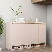 Un meuble à chaussures en bois blanc et gris, élégant et simple, utilisé pour l'entrée, avec une porte et des compartiments cachés