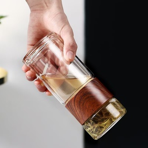 CHUFENG Nouveaux produits écologiques 2024 Bouteille à <span class=keywords><strong>double</strong></span> <span class=keywords><strong>paroi</strong></span> en <span class=keywords><strong>verre</strong></span> 200-300ml avec logo personnalisé et manchon pour séparation thé/eau - Product Image 4