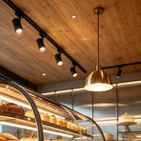 Airy Luxe Bakery & Coffee Market Stall Featuring Glass Display Case, Open Tiered Shelving, and Integrated Warm Lighting