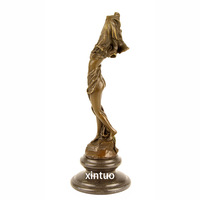 Sculpture en bronze fabriquée à la main représentant une danseuse nue: une œuvre d'art pour les amateurs d'art du monde entier