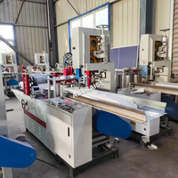 Machine de fabrication de serviettes hygiéniques entièrement automatique à deux couleurs Machine de découpe pliante pour serviettes Machine de fabrication de serviettes hygiéniques