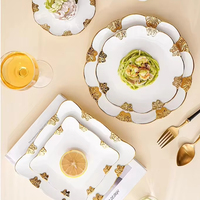 Ensemble d'assiettes de service en céramique de luxe nordique avec bord doré ensemble de vaisselle en porcelaine assiettes en céramique blanche pour mariage