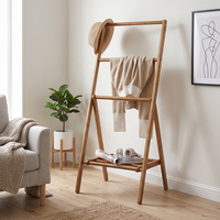 Porte-vêtements moderne en bambou, support de rangement sur pied avec base surélevée pour chambre à coucher