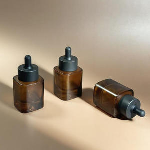High Quality Mini Eco-Friendly Custom <b>30ml</b> Amber Glass Dropper <b>Bottle</b> for Essential Oils with Unique Bottom Design - Product Image 1