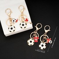 Porte-clés pendentif mini-joueur de football/soccer en alliage de zinc, style dessin animé vintage, mode européenne et américaine, finition émail goutte d'huile, pour passionné de sport