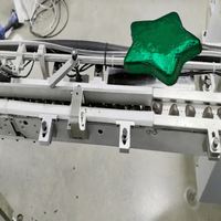 Machine d'emballage automatique à haute production pour chocolats en forme d'étoile à cinq branches en feuille métallique, personnalisable