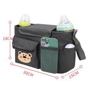Organizador de cochecito universal con estampado de dibujos animados con portavasos aislado bolsas de pañales para mamá bolsa organizadora de cochecito de bebé - Product Image 6