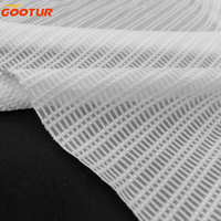 Tissu tricoté en maille respirante avec conception à grille 93% Polyester 7% Spandex Textile pour la fabrication de gilets de course et de vêtements de sport