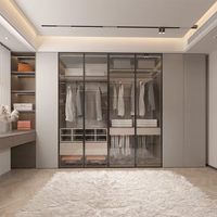 Sistema de Closet Moderno e Luxuoso com Portas de Vidro e Iluminação LED, Mesa de Maquiagem Embutida, Ideal para Residências de Alto Padrão
