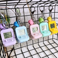 Porte-clés en métal en forme de console de jeux animaux de dessin animé, pendentif de sac à main, vente en gros, ornements pour sac de voiture, cadeau promotionnel pour enfants