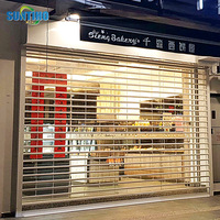 Centre commercial intérieur levage électrique alliage d'aluminium transparent volet roulant silencieux épaissi porte coulissante porte de garage
