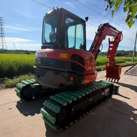 Mini-excavatrice sur chenilles Kubota U55-5 d'occasion, 5,5 tonnes, avec pince hydraulique, attache rapide, moteur EPA, prête à l'emploi