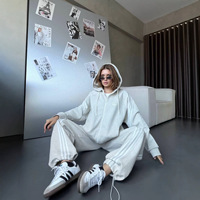Ensemble sport et loisirs de style européen et américain avec empiècements contrastés, veste à col montant zippée et pantalon large