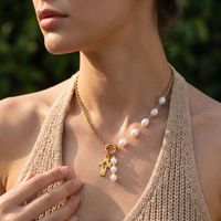 Collier pour femme Bowei, style européen et américain, en acier inoxydable électroplaqué, luxe léger, niche, imitation perle, croix, clavicule
