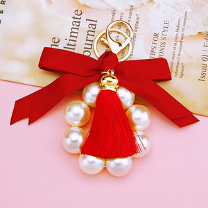 <span class=keywords><strong>Gros</strong></span> femmes grande perle noeud papillon sac <span class=keywords><strong>porte</strong></span>-clés cadeau tissu noeud noeud gland perle <span class=keywords><strong>porte</strong></span>-clés pour sac - Product Image 5