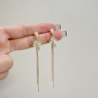Boucles d'oreilles tendance chic et élégantes pour femmes, style français, douces, avec pierres œil-de-chat et pompons en forme de feuille de fleur