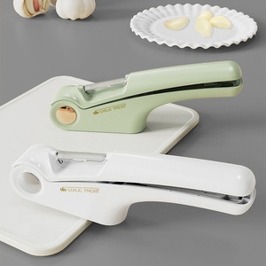 <span class=keywords><strong>Presse</strong></span>-ail <span class=keywords><strong>manuel</strong></span> multifonctionnel 4-en-1 Outil de cuisine en acier inoxydable pour <span class=keywords><strong>purée</strong></span> de légumes <span class=keywords><strong>Presse</strong></span> à comprimés en plastique de haute qualité - Product Image 1