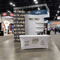 Équipement d'exposition pour salons professionnels : Stands publicitaires, toiles tendues en aluminium, toiles de fond et vitrines pour événements