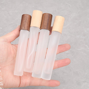 Luxury Custom Empty Small Refillable 3ml-30ml <b>Mini</b> Glass Perfume Roll on <b>Bottles</b> Clear Surface Cylinder Wooden Cap - Product Image 4