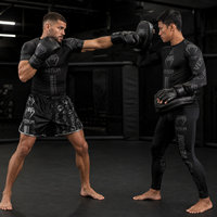 Ensemble 4 pièces noir et argent : short de boxe, maillot de compression, pantalon d'entraînement MMA 100% polyester extensible à séchage rapide, logo personnalisé OEM ODM